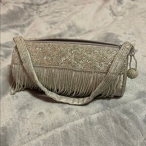 La Regale Silver Fringe Clutch